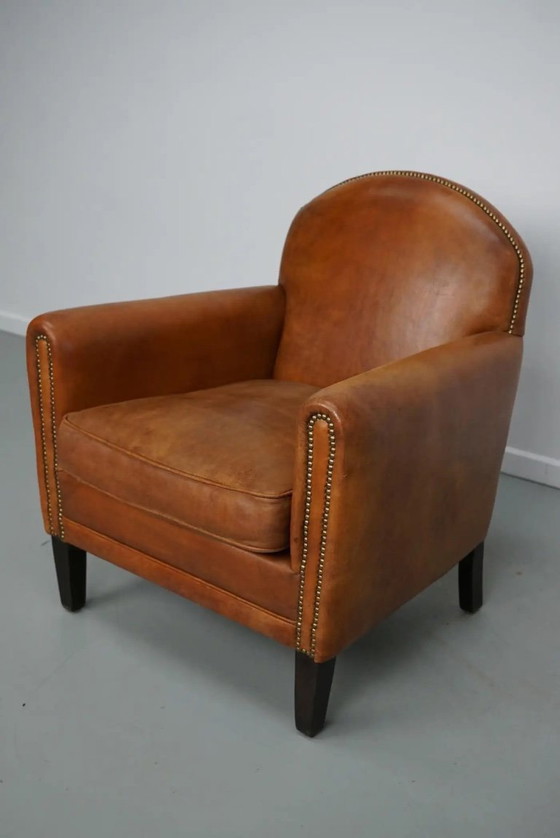 Image 1 of Vintage Nederlandse clubfauteuil van cognackleurig leer