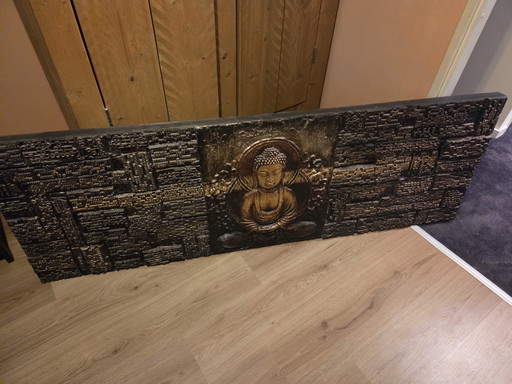 Decorazione murale in legno raffigurante il Buddha