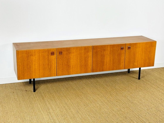 Image 1 of Minimalist Scandinavian sideboard in teak with black metal legs, 1960