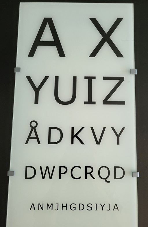 Lampada da parete vintage IKEA, modello Gyllen Eye Exam, oggetto da collezione.