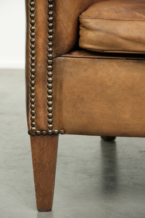 Sturdy Worn Vintage Sheepskin Club Armchair With A Comfortable Seat And A Beautiful Color – Leather (photo 12 of 13)