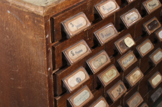 Image 1 of Antieke industriële apothekerskast • Vintage hout en metaal