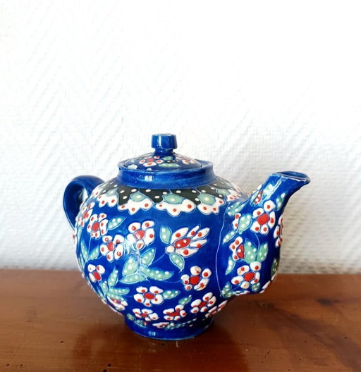 Vintage glazed ceramic teapot