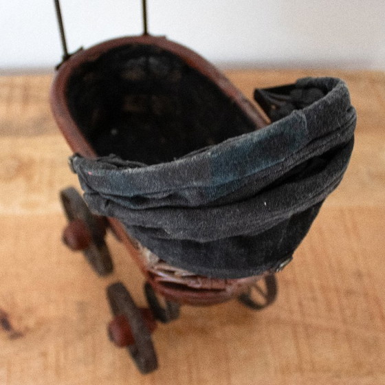Image 1 of Antique Victorian-style doll pram