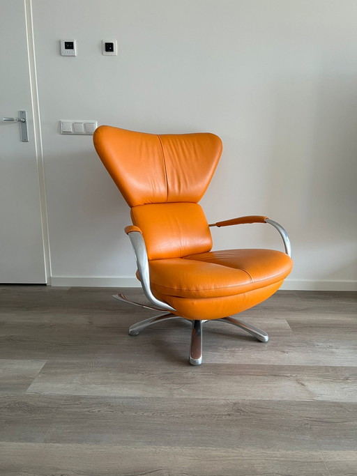 Poltrona Leolux con pouf