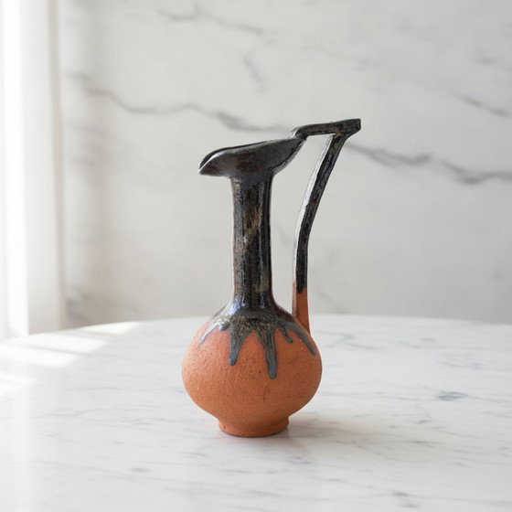 Terracotta ceramic vase with dark metallic drip glaze (photo 2 of 6)