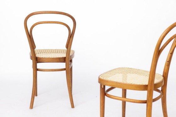 Image 1 of Pair of Vintage Thonet Model 14 Chairs | Radomsko Bentwood Dining Chairs | New Cane Seats