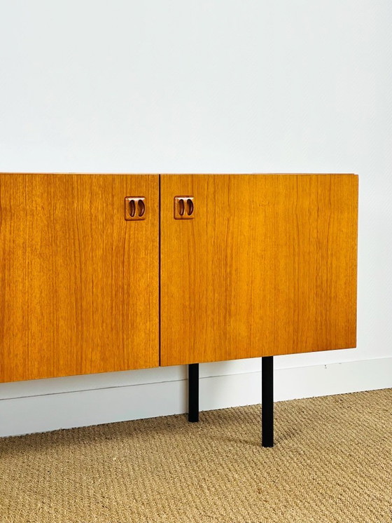 Image 1 of Minimalist Scandinavian sideboard in teak with black metal legs, 1960
