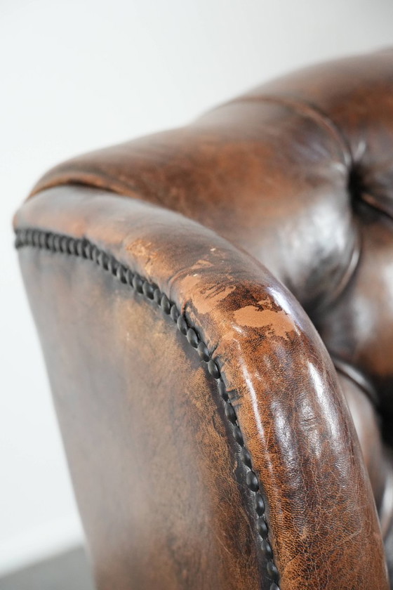Image 1 of Unique large English-style sheepskin Chesterfield wing armchair