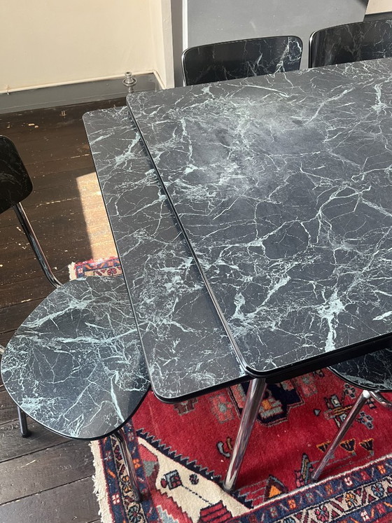 Image 1 of Vintage Formica extendable dining table with 6 chairs