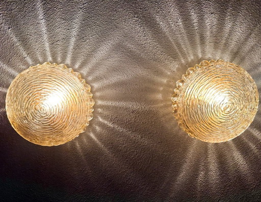 Vintage pair of amber glass wall lamps