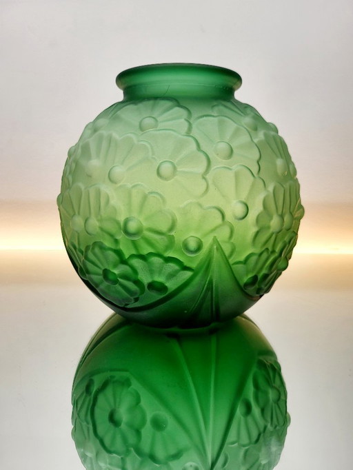Art Deco vase in frosted green pressed glass with floral decoration