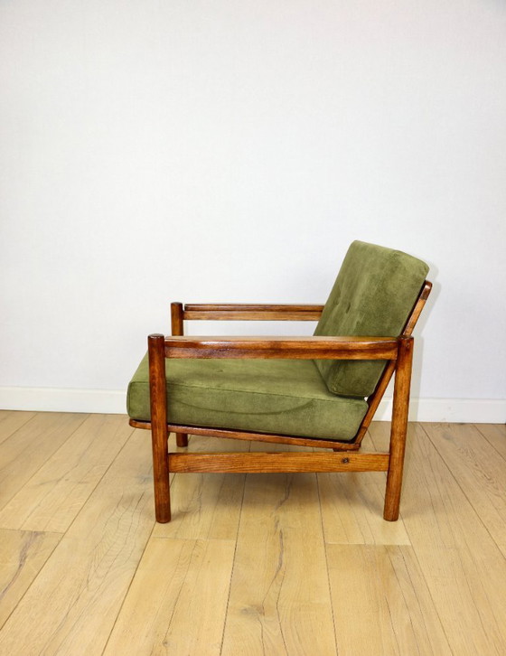Image 1 of Wooden armchair designed by Z. Baczyk in a vintage style, upholstered in olive green velvet.