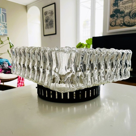 Image 1 of A large flush mount designed for both wall and ceiling application, in the 1970s.  This particular type of fixture tends to sit 