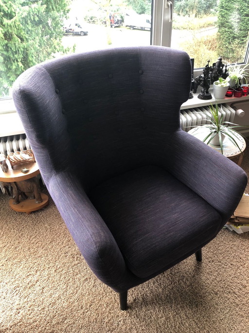 Poltrona bergère color antracite con schienale trapuntato