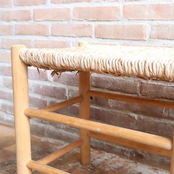 Image 1 of https://www.meutt.nl/a-109283495/fauteuils-stoelen/vintage-oud-bankje-rieten-zitting-hal/