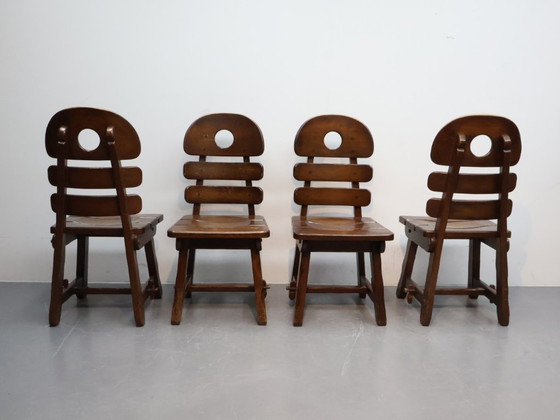 Image 1 of Brutalist fishbobe chairs set van 4 massief eikenhout