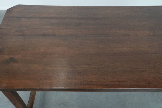 Image 1 of Antieke Franse eettafel voor 4 tot 6 personen uit eind 18e/ begin 19e eeuw met een eiken blad en een brood/ uittrek plank