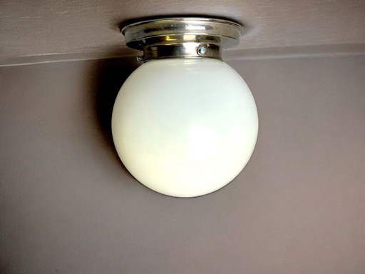 Minimalist white opaline globe flush mount light