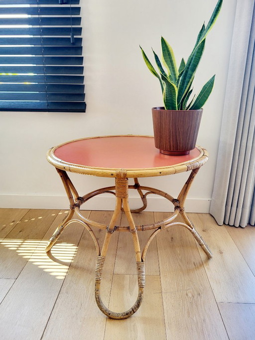 Rattan coffee table model Diabolo, design KOK with orange top