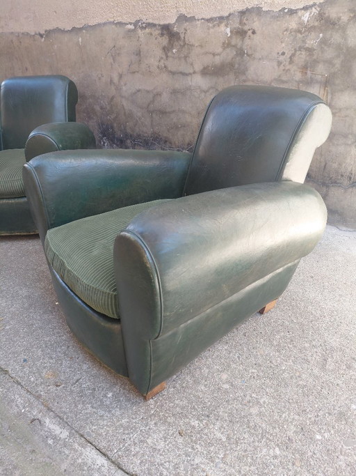 Pair of leather club chairs