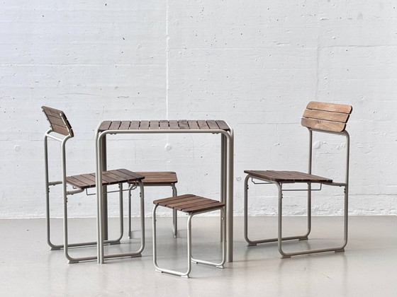 Image 1 of IKEA FURUÖN tuinset met tafel, 2 stoelen en 2 krukjes, gemaakt van acaciahout.