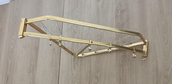 Image 1 of Fifties corner string coat rack