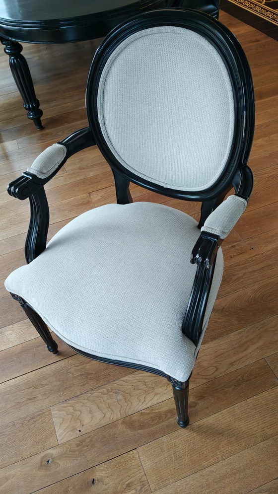 Image 1 of Table de salle à manger ovale noire avec 6 chaises