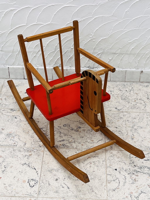 Cheval à bascule années 80