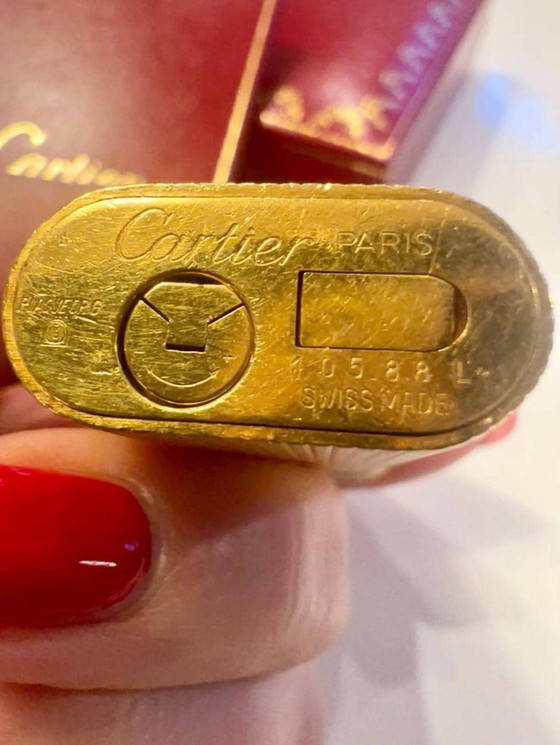 Image 1 of Original vintage Cartier Lighter gold-plated with Trinity ring made in 1983 with certificate, original box and case