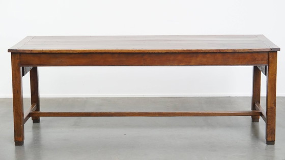 Image 1 of Table de salle à manger ancienne en bois fruitier du 18ème siècle avec 2 tiroirs