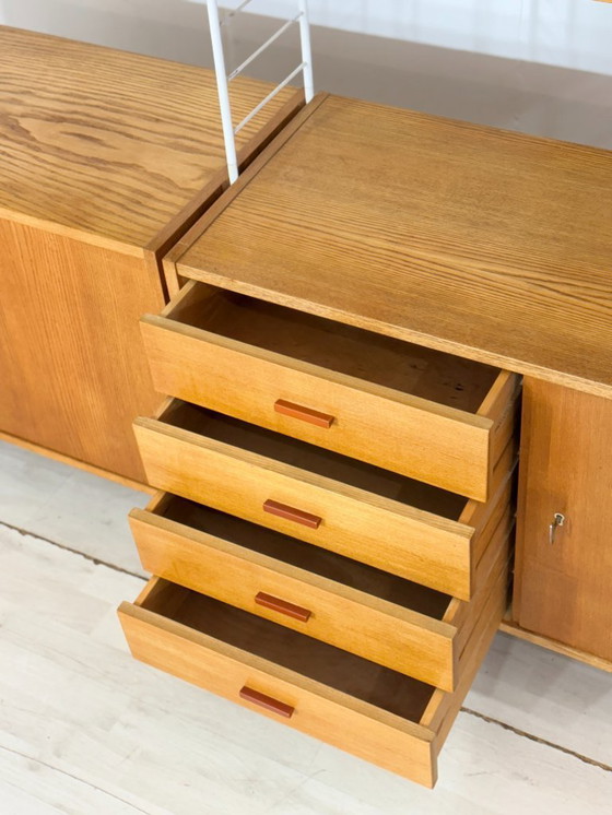 Image 1 of Mid-century string shelving / vintage wall shelf / Sybille 314 living room wall unit / living room wall unit