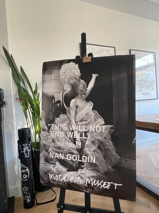 Image 1 of Nan Goldin, exibition poster  “This Will Not End Well” Naomi presenting a stage show, Boston (1973) fran The Other Side, 1992-20