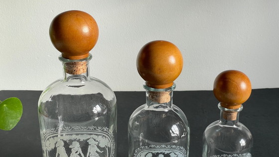 Image 1 of Vintage Engraved Glass and Wood Bottles