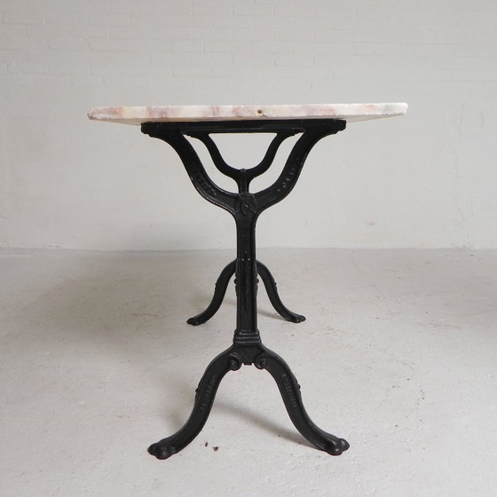 Image 1 of Table de bistrot avec plateau en marbre sur piètement en fonte, PARIS, années 1930