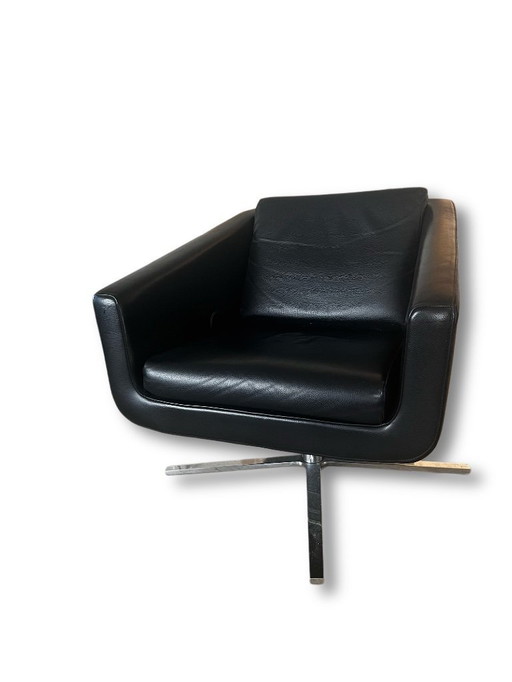FSM Pavo Relax, with footrest, reclining position, and folding headrest. Available in black leather.