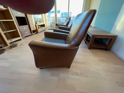 Mid 1900 lederen fauteuils