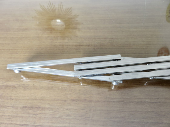 Image 1 of Jacques Adnet extendable silver-plated trivet, 40s 50s