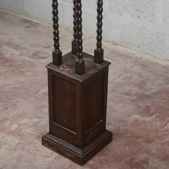 Porta piante da ingresso in legno scuro tornito (photo 14 of 15)