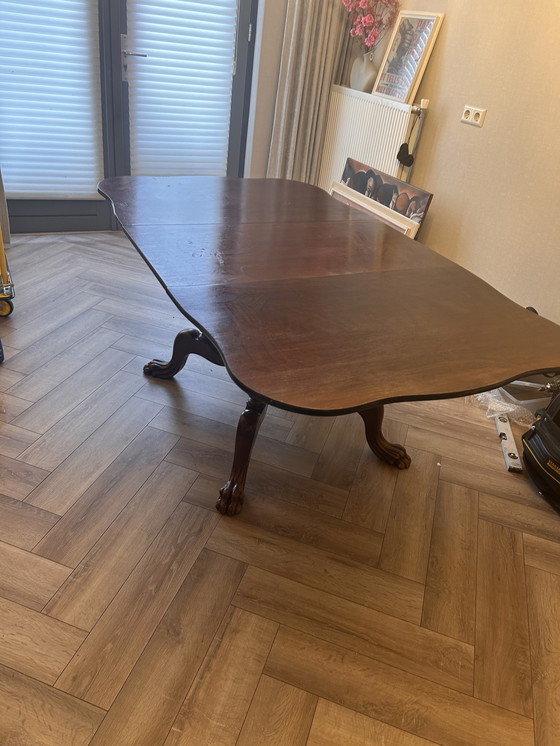 Image 1 of Table à manger extensible ancienne – bois massif – pieds griffes – pièce de caractère