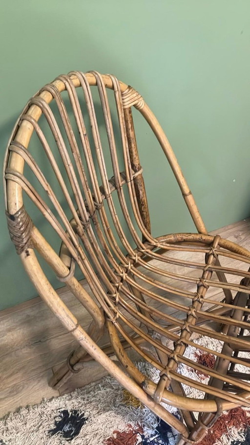 1x Rattan chair by Pierre Hardy