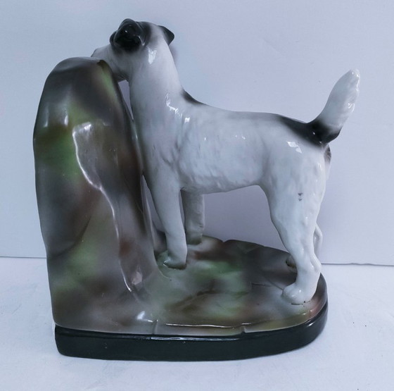 Image 1 of Genummerde porseleinen boekensteun met foxterriërmotief