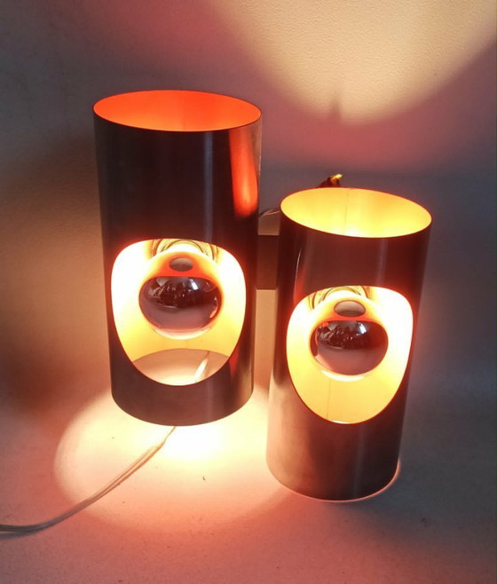 Image 1 of Een paar dubbele oranje Oxar Space Age wandlampen uit de jaren 70.