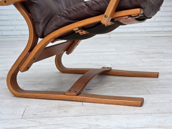 Image 1 of Fauteuil danois des années 1970 de la marque Komfort, cuir, toile et bois courbé.