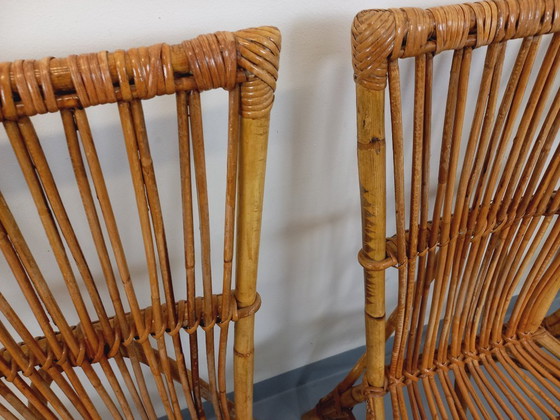 Image 1 of Suite de 4 chaises vintage Audoux Minet en rotin des années 50 60