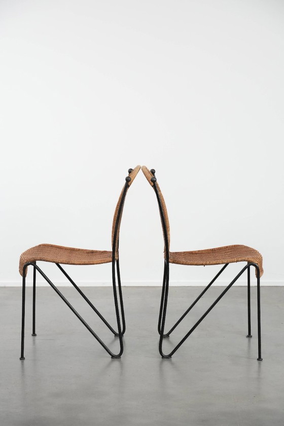 Image 1 of 2x Vintage design eetkamerstoelen van Frederick Weinberg met een gietijzeren frame