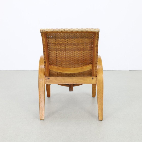 Image 1 of Rare fauteuil vintage en bois et canne, 1960S