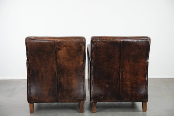 Image 1 of 2 eleganti poltrone di design in pelle di pecora con splendidi colori intensi e un design senza tempo