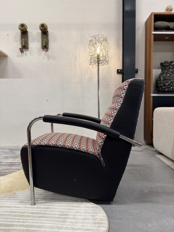 Image 1 of Sillón alto Leolux Scylla de piel sintética roja.