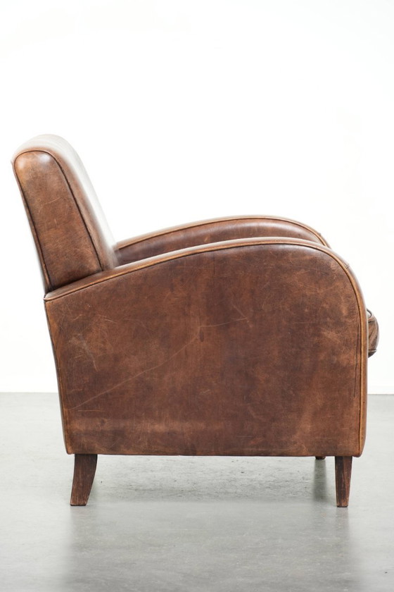 Image 1 of Sessel aus Schaffellleder mit wunderschönem, zeitlosem Design und herrlich warmen Farben